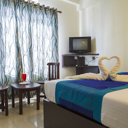 Hotel Sm Regency Kochi Exterior photo
